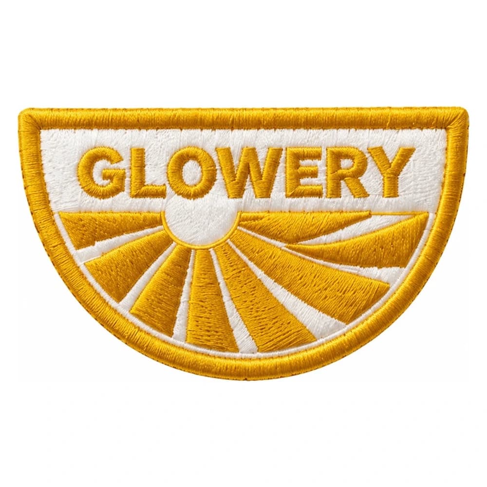 Patch brodé du label Glowery, demi-rond au soleil jaune